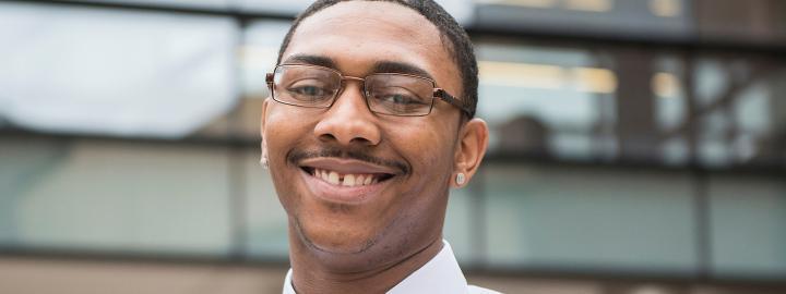 Student smiling outdoors